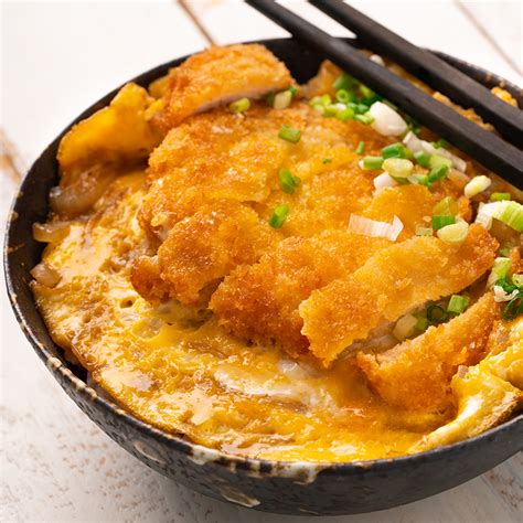 Recipe for katsu don - Instructions. Drizzle the pork chops that’s been pounded with salt and pepper. Dust with a light, even coat of flour. Get a small bowl and beat 1 egg in it, then put the panko in another small bowl. Preheat the skillet over medium heat and pour the cooking oil in it until it gets hot. Dip the pork into the egg to coat.